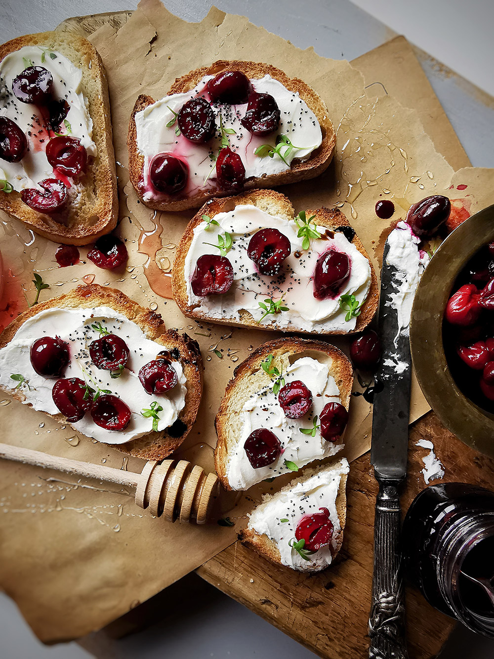 Creamy goat cheese balsamic roasted sour cherry toasts