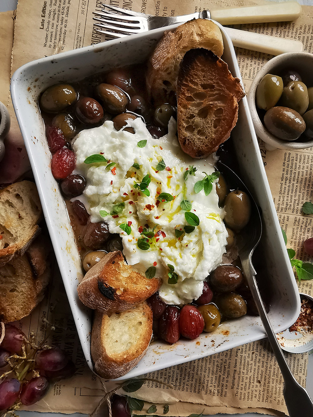 Roasted grapes and olives with burrata