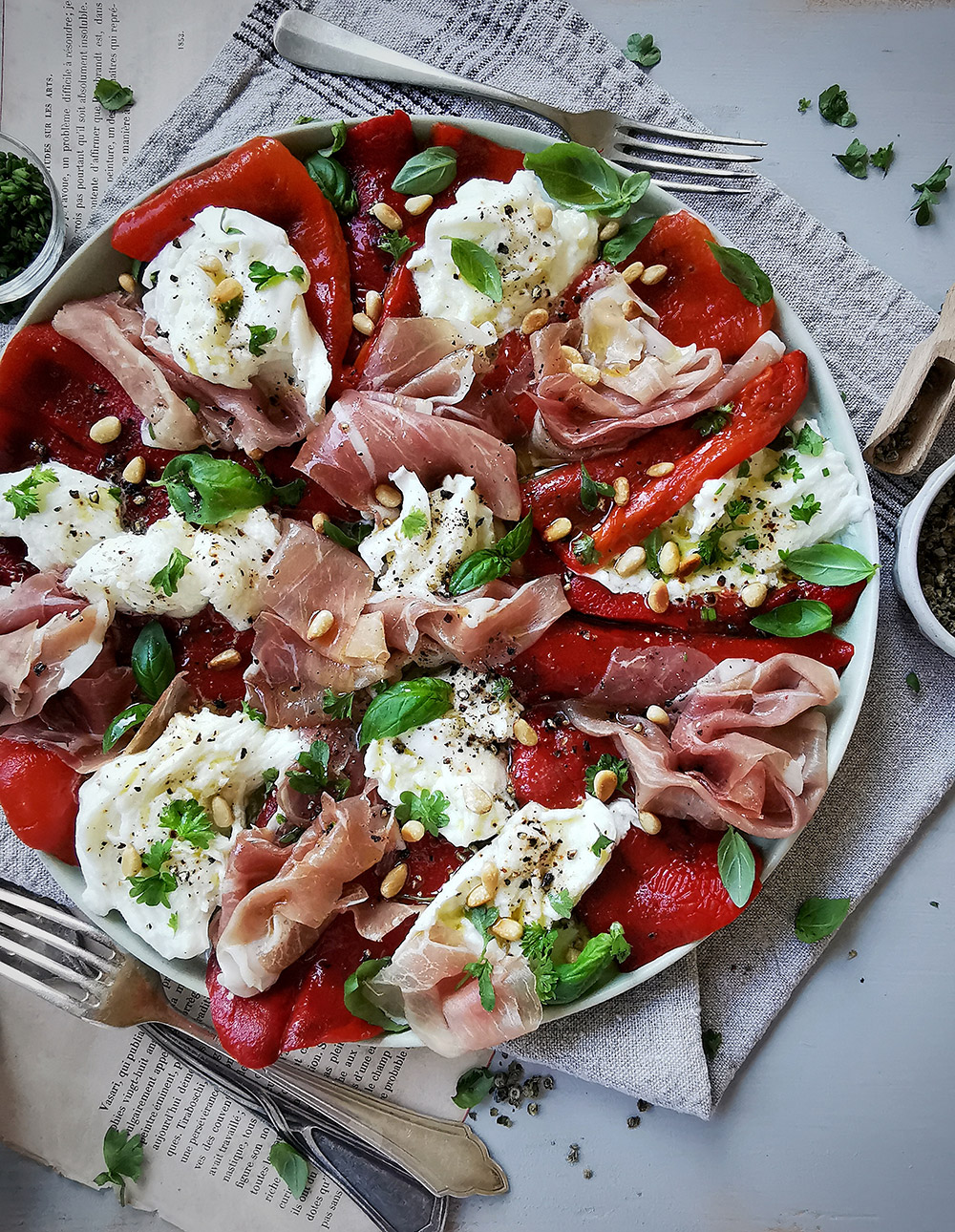 Grilled peppers, burrata, prosciutto and basil