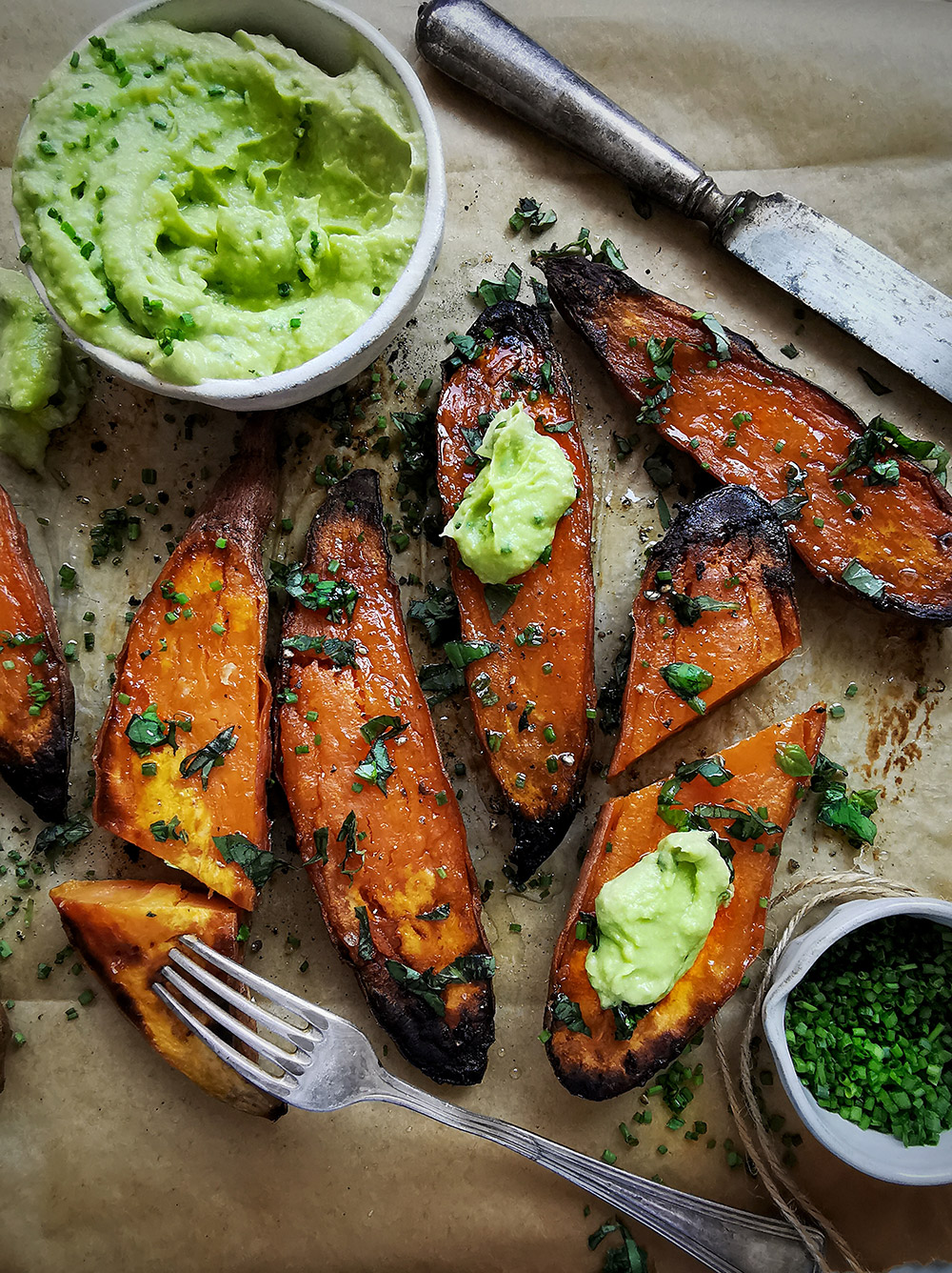 Roasted sweet potatoes with avocado lime dip