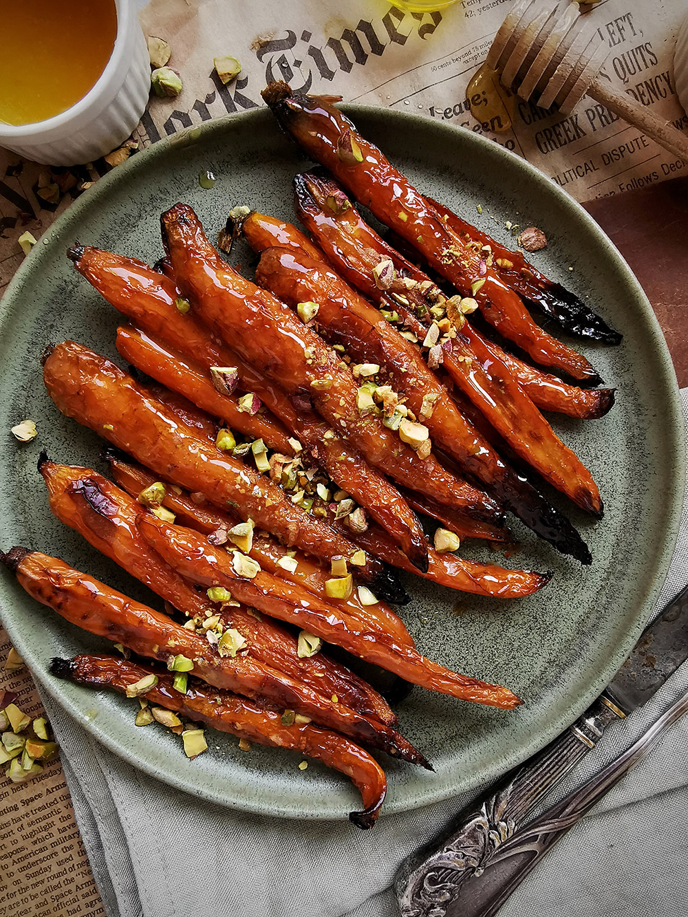 Buttered roasted carrots with pistachio
