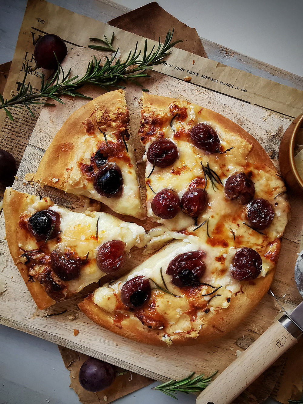 Roasted grapes three cheeses pizza