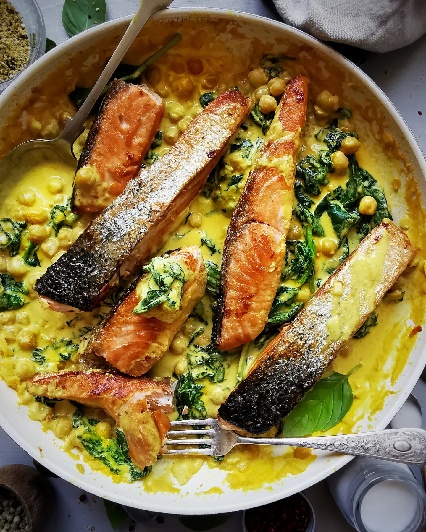 Curry coconut salmon with chickpeas and spinach