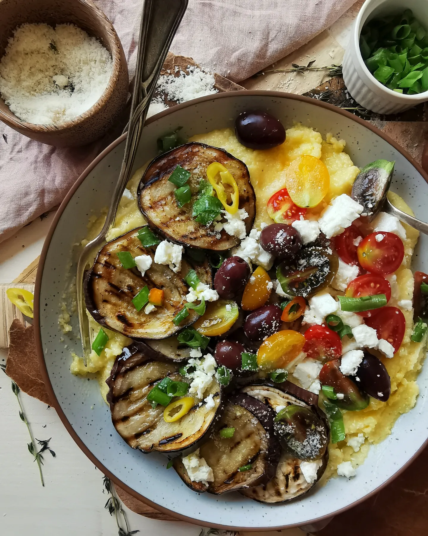 Grilled eggplant, feta, kalamata olives cherry tomatoes and creamy parmesan polenta