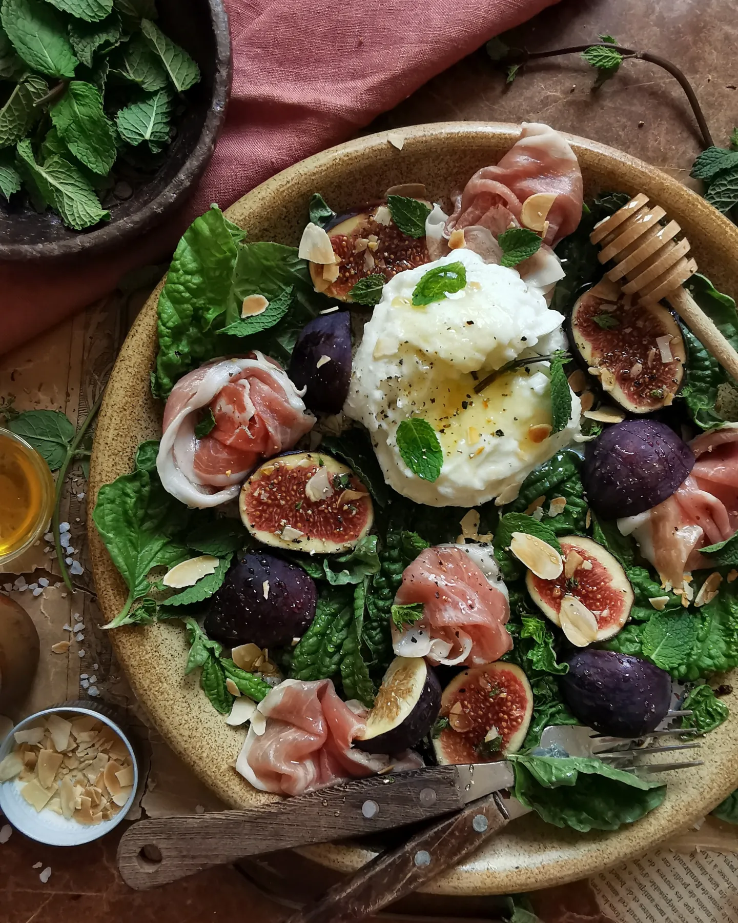Burrata, figs, prosciutto, basil salad