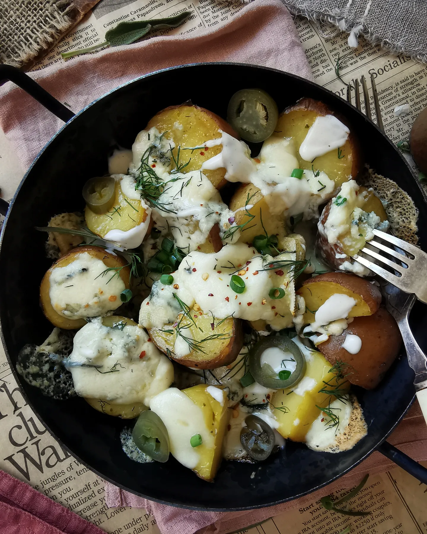 Potatoes with three cheeses, jalapeño, dill and spring onion