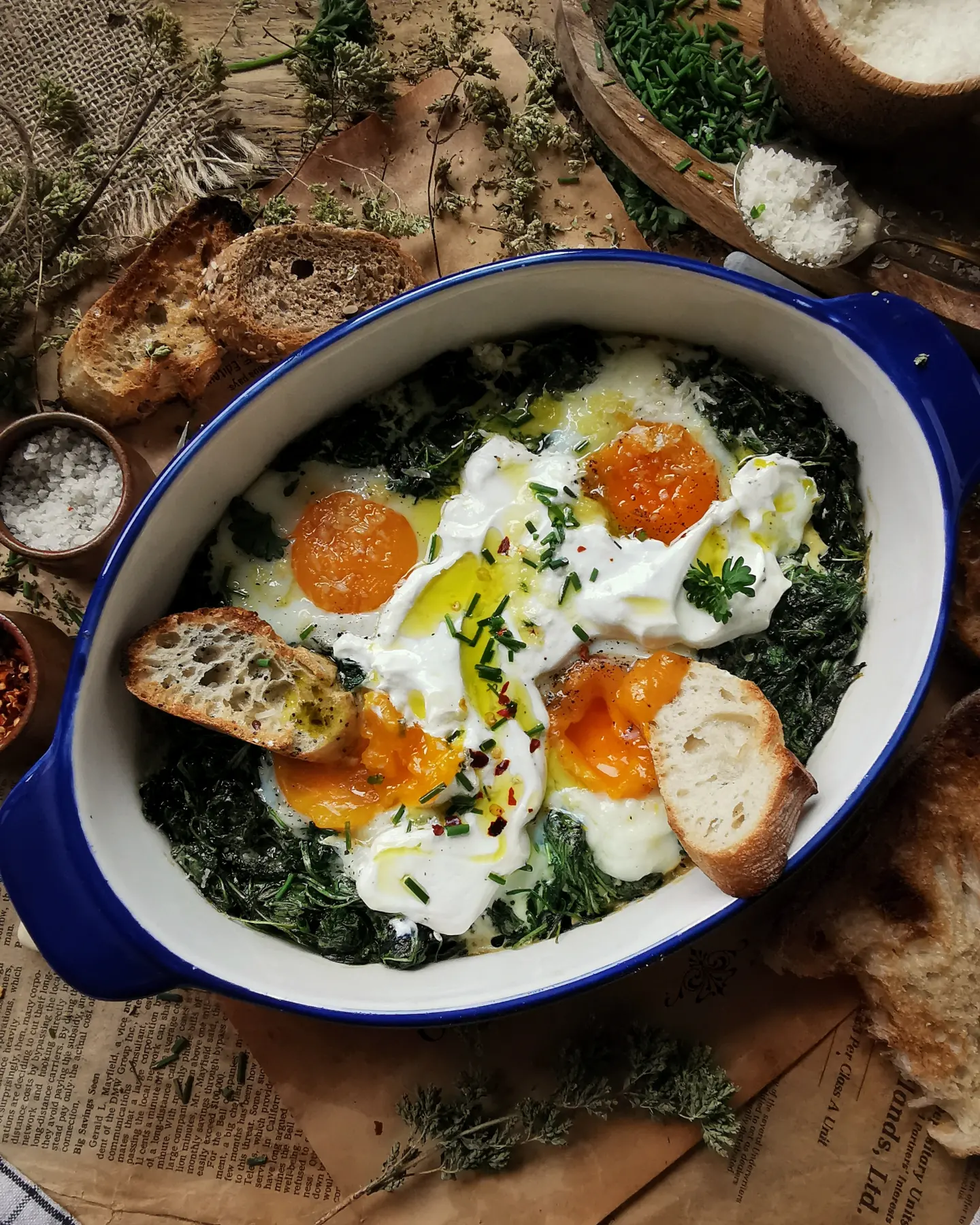 Baked eggs with garlicky kale and sour cream