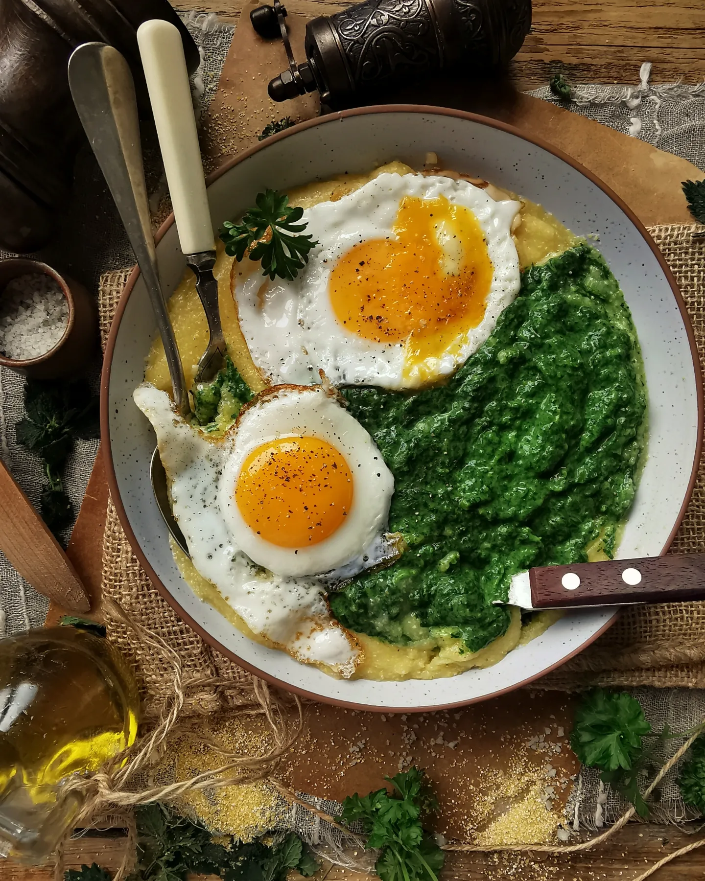 Nettles with spinach, fried eggs and creamy polenta