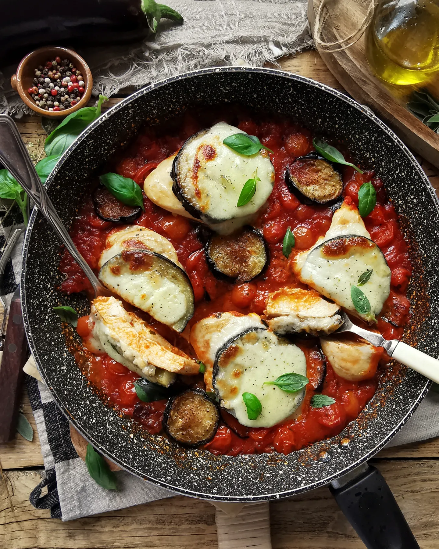 One pan chicken with eggplant, mozzarella, tomatoes and basil